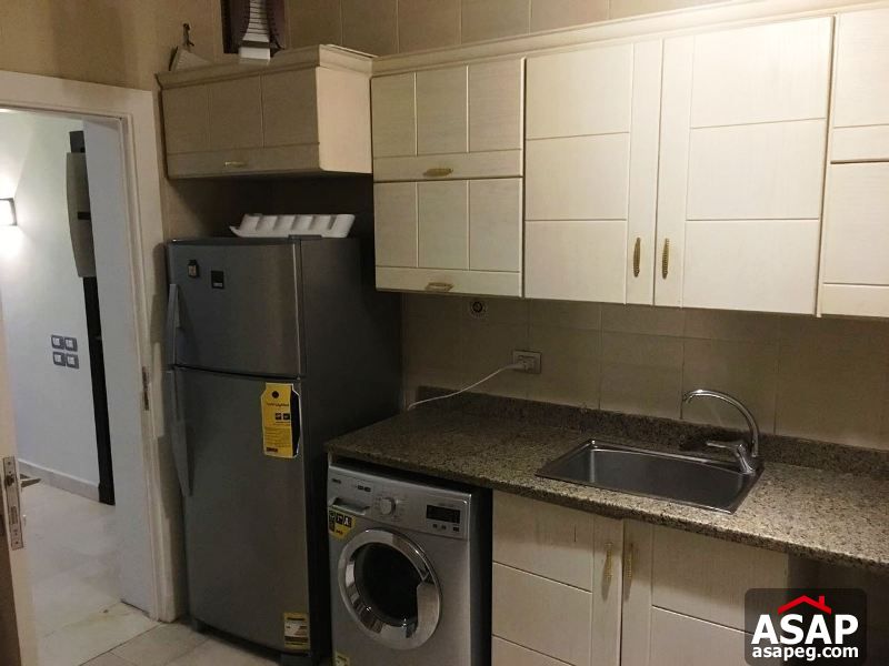 Furnished Apartment with Garden in the Village Furnished Apartment with Garden in the Village