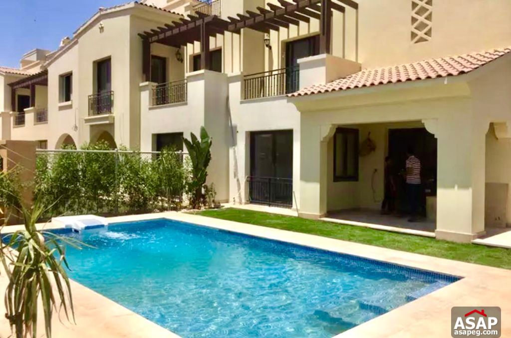 Town House with Swimming Pool for Rent in Mivida Compound Town House with Swimming Pool for Rent in Mivida Compound