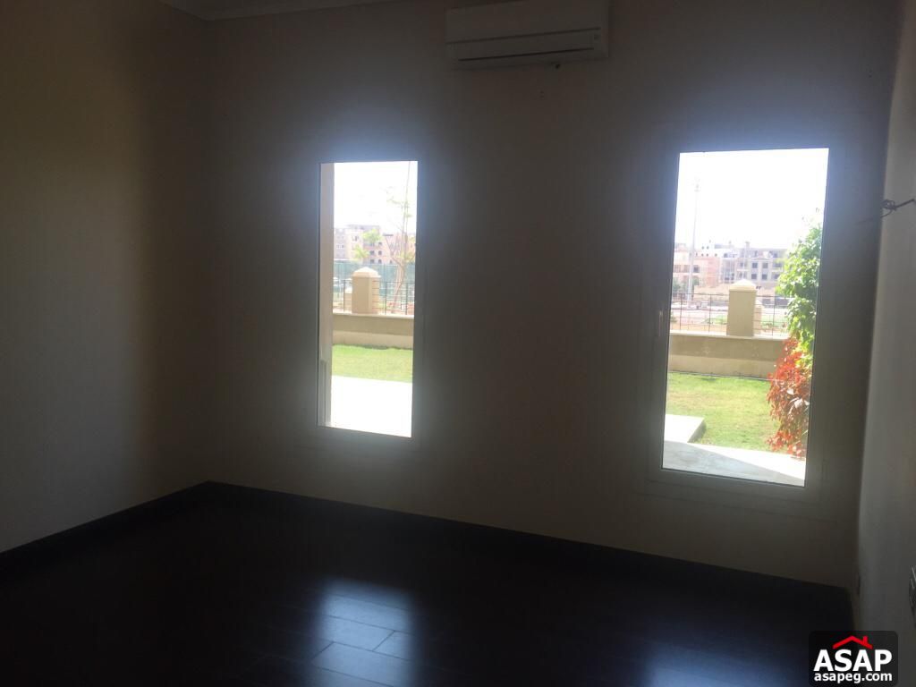 Apartment with Private Garden in The Village Palm Hills