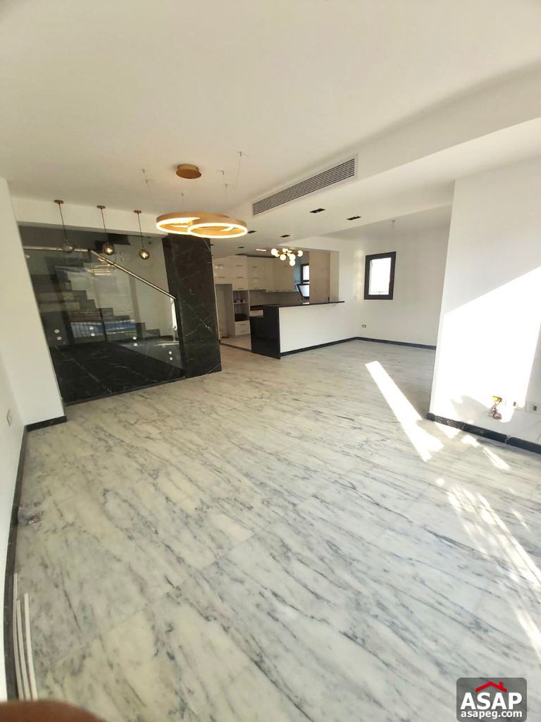 Town House with Swimming Pool for Rent in Mivida Compound Town House with Swimming Pool for Rent in Mivida Compound