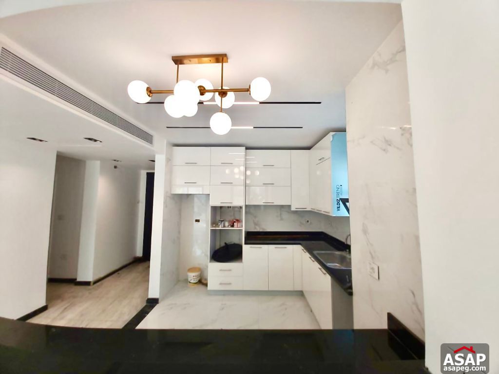 Town House with Swimming Pool for Rent in Mivida Compound Town House with Swimming Pool for Rent in Mivida Compound