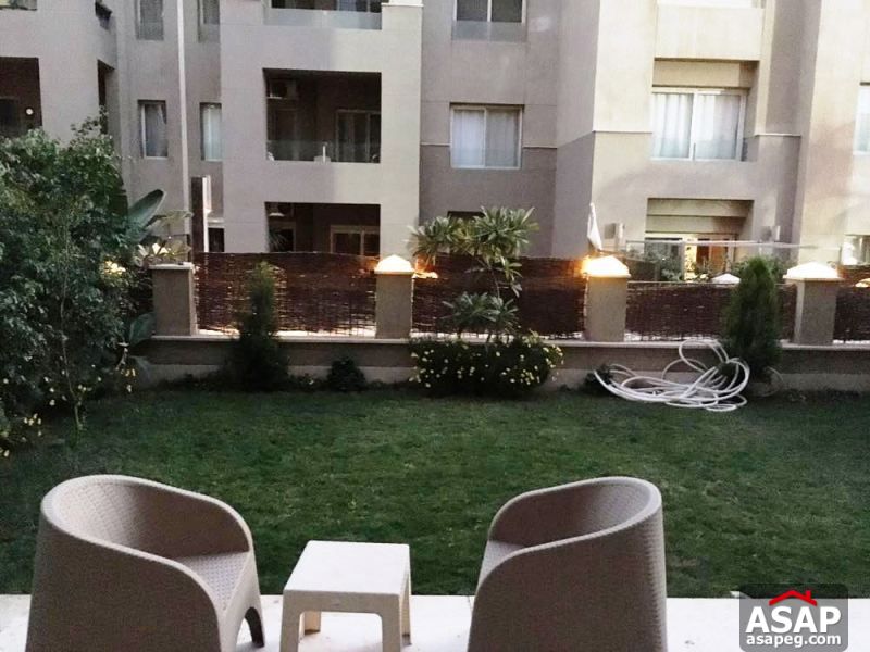 Furnished Apartment with Garden in the Village Furnished Apartment with Garden in the Village