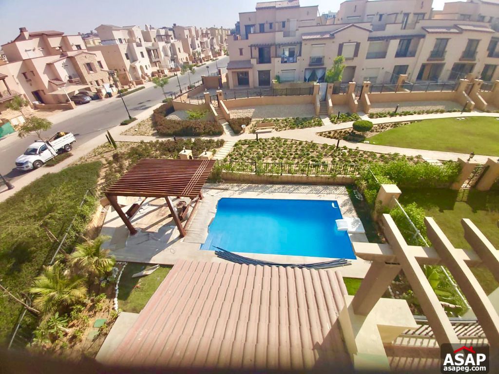 Town House with Swimming Pool for Rent in Mivida Compound Town House with Swimming Pool for Rent in Mivida Compound