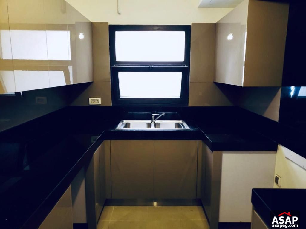 Semi Furnished Apartment for Rent in Mivida Compound Semi Furnished Apartment for Rent in Mivida Compound