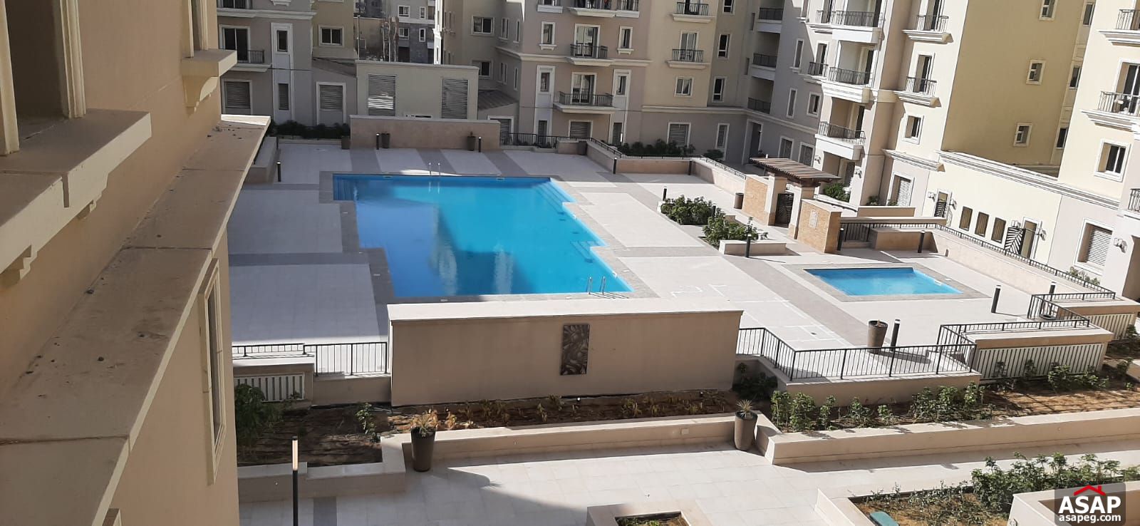 Apartment with Pool View for Rent in Mivida Compound Apartment with Pool View for Rent in Mivida Compound