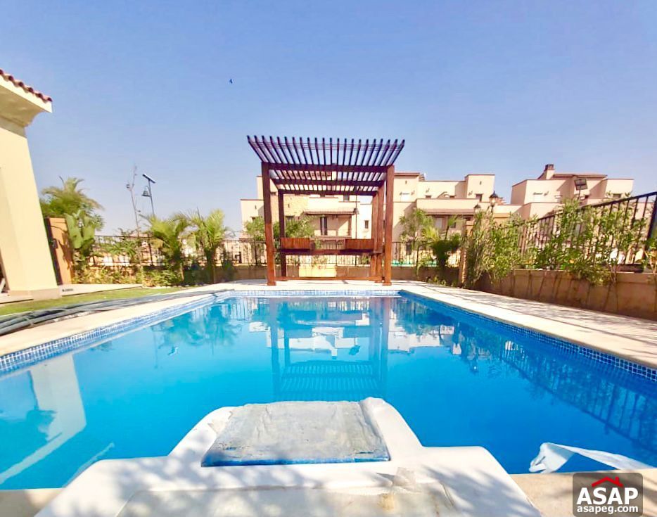 Town House with Swimming Pool for Rent in Mivida Compound Town House with Swimming Pool for Rent in Mivida Compound