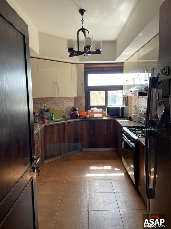 Semi Furnished Apartment for Rent in Mivida Compound Semi Furnished Apartment for Rent in Mivida Compound