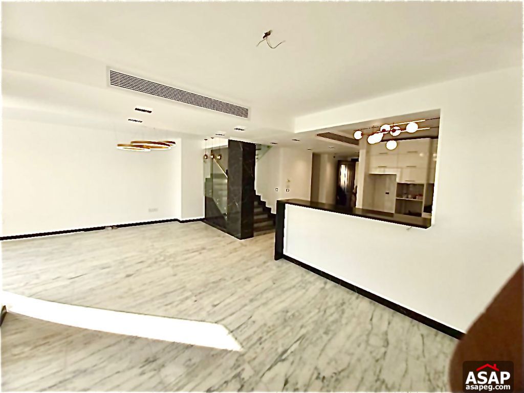 Town House with Swimming Pool for Rent in Mivida Compound Town House with Swimming Pool for Rent in Mivida Compound